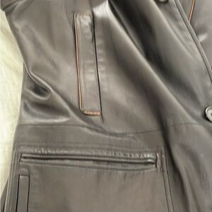 Brioni leather overcoat and lamb skin from Neiman Marcus.